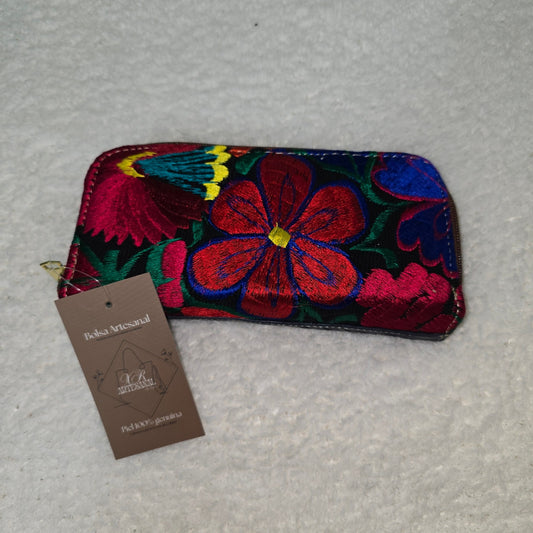 Colorful embroidered wallet with a tag 
