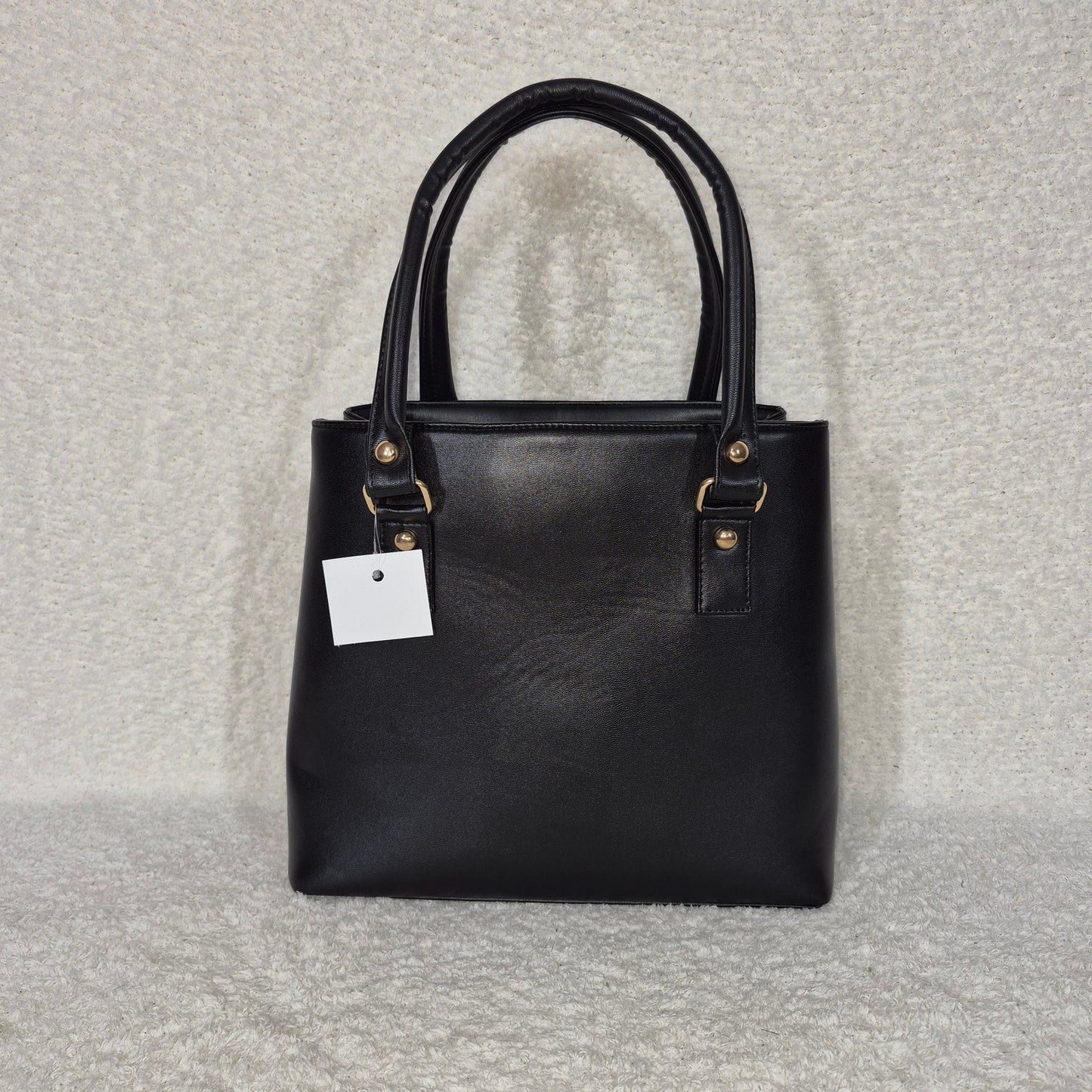 Handcrafted Mexican Black Vegan Leather Trapezoid Handbag with Embossed Aztec Calendar