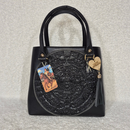 Black Vegan Leather Trapezoid Handbag with Embossed Aztec Calendar — Handmade in León, Mexico