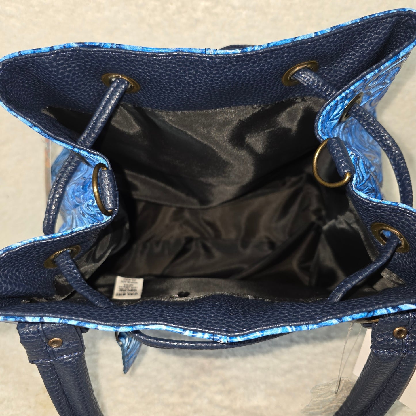 Tooled Blue Floral Leather Drawstring Bucket Bag